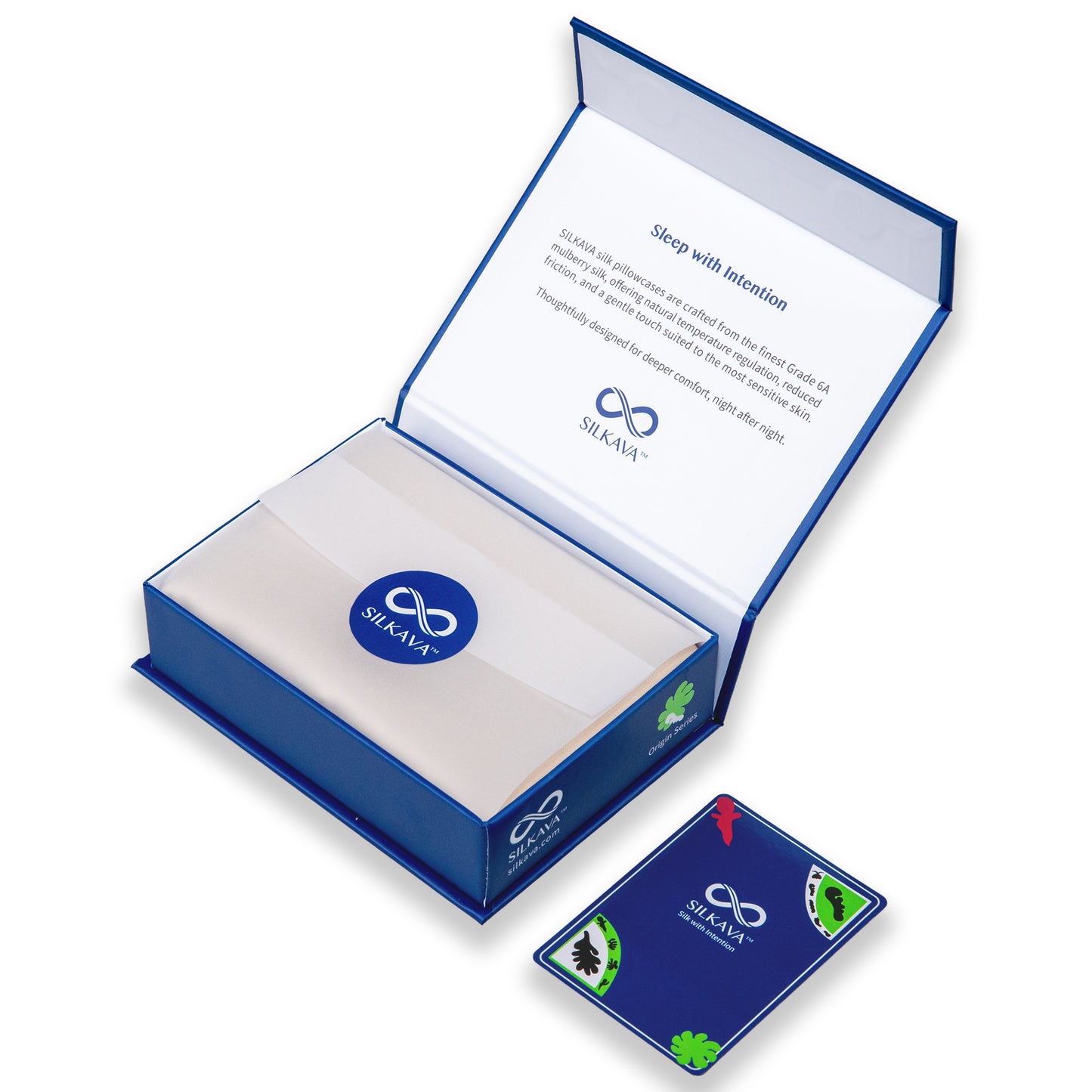 SILKAVA silk pillowcase in packaging with tissue paper, alongside Origin Series collectible card, champagne