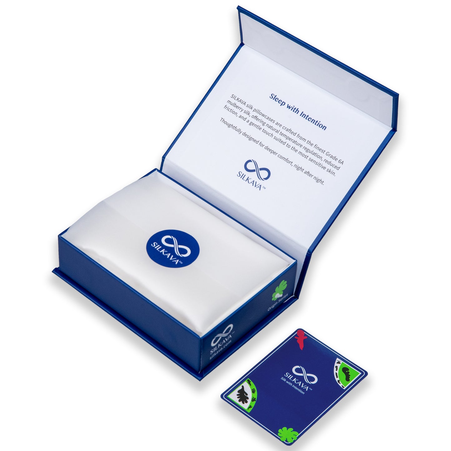 SILKAVA silk pillowcase in packaging with tissue paper, alongside Origin Series collectible card, white